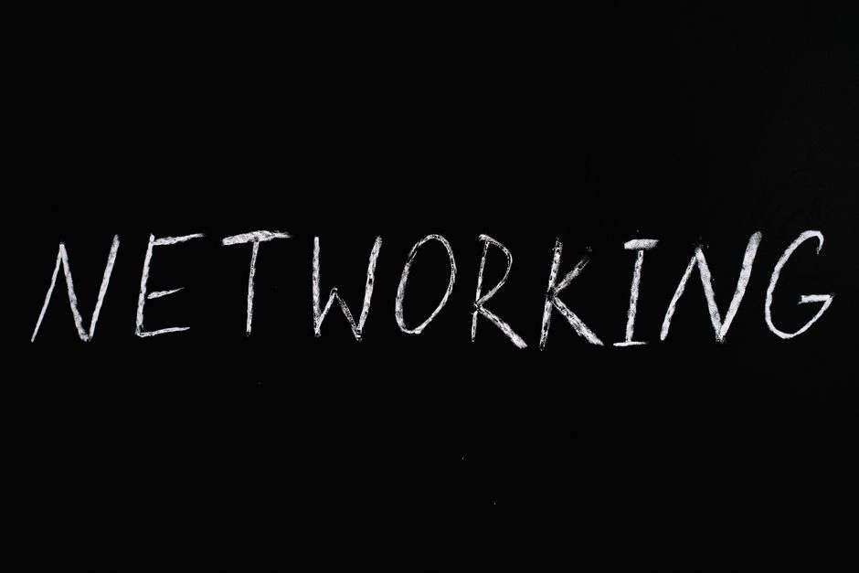 Handwritten 'Networking' text on a chalkboard styled black background, symbolizing communication.
