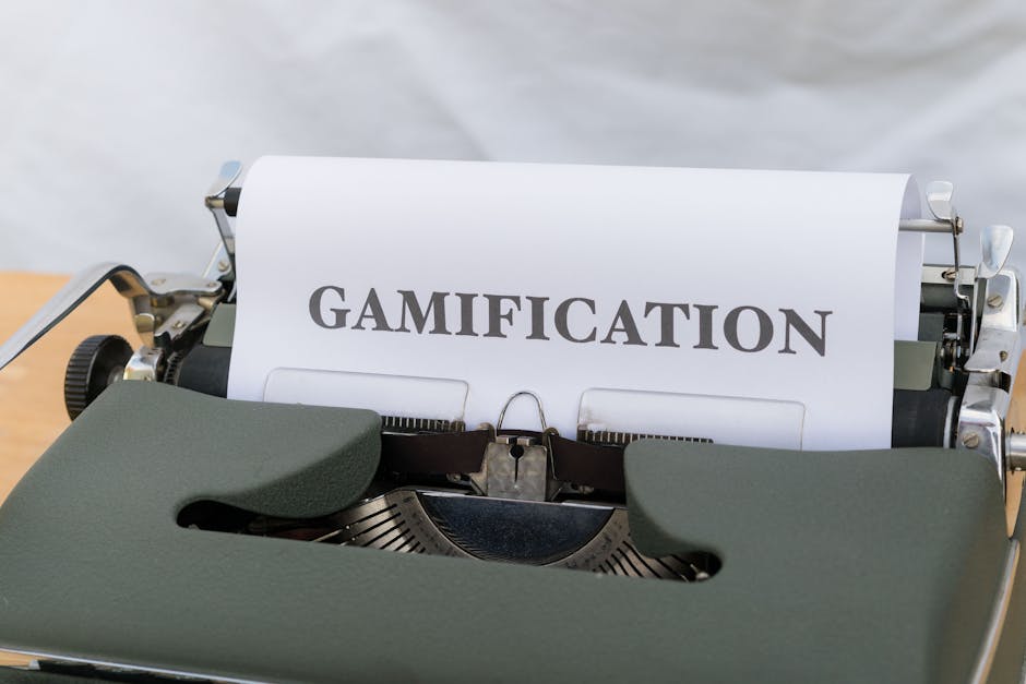 Close-up of a vintage typewriter displaying the word 'Gamification' on paper.