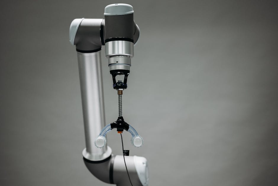 Close-up of an advanced robotic arm equipped with precision tools, showcasing technology and innovation.